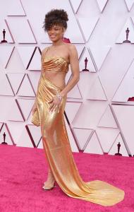 Andra Day arrives at the Oscars on Sunday, April 25, 2021, at Union Station in Los Angeles. (AP Photo/Chris Pizzello, Pool)