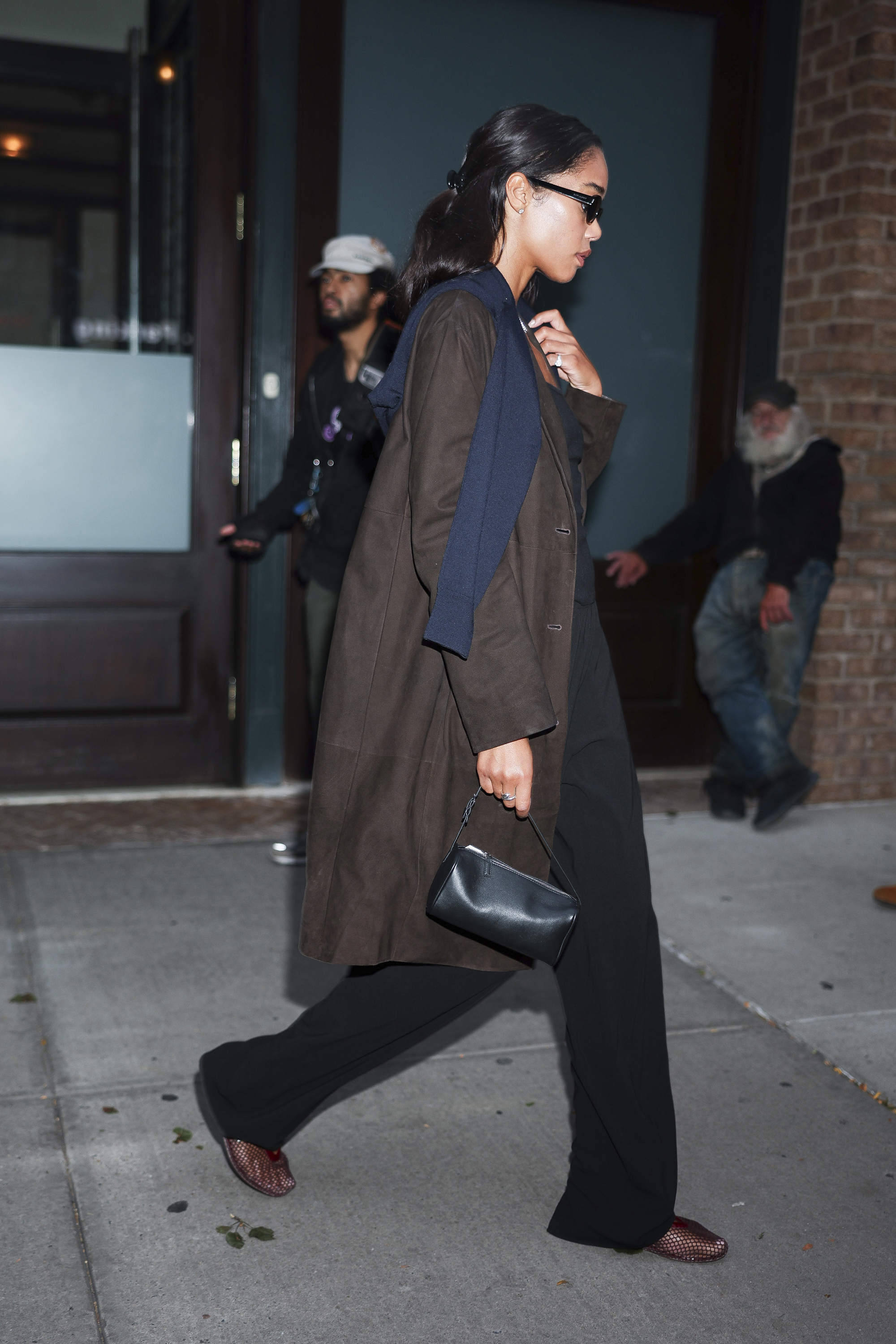 Laura Harrier carries a The Row '90s bag