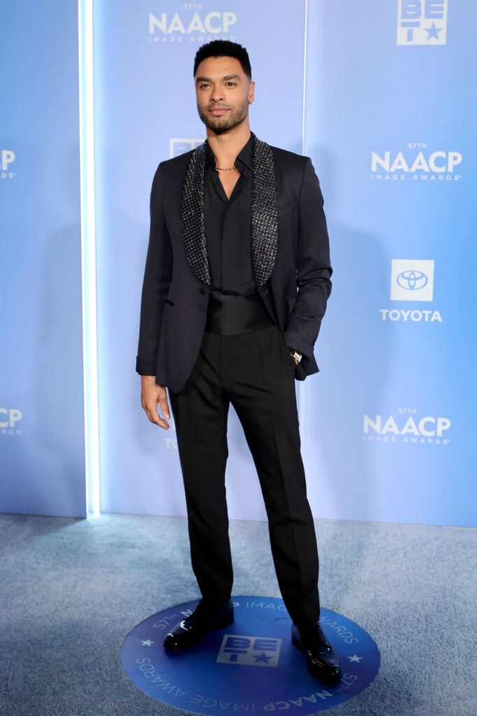 Regé-Jean Page NAACP Image Awards 2026, Regé-Jean Page Brioni suit, Brioni black tuxedo, Spinelli Kilcollin ring, David Yurman chain, NAACP Image Awards mens fashion