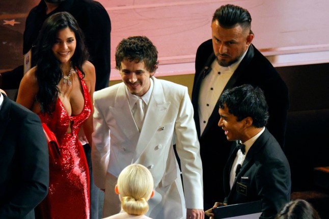 Timothee Chalamet and Kylie Jenner arrive for the Oscars show at the 98th Academy Awards in Hollywood, Los Angeles, California, U.S., March 15, 2026. REUTERS/Mike Blake