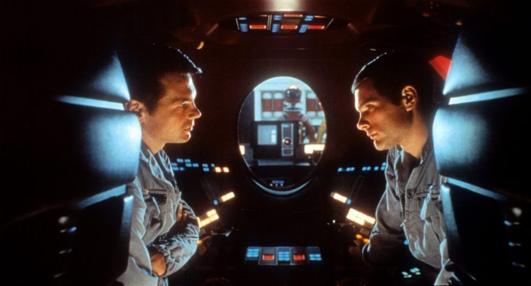 Gary Lockwood talks to Keir Dullea in a scene from the film '2001: A Space Odyssey', 1968. (Photo by Metro-Goldwyn-Mayer/Getty Images)