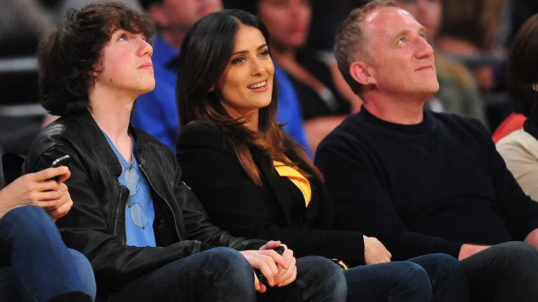 Salma Hayek, 59, scorches in orange bikini and body chain for SI Swim image