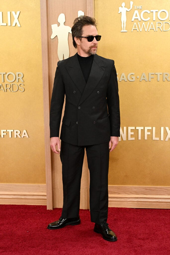 Sam Rockwell Prada Actor Awards 2026, Prada double breasted suit, Sam Rockwell red carpet style, classic black tailoring, double breasted menswear, sharp fitted suit, formalwear 2026