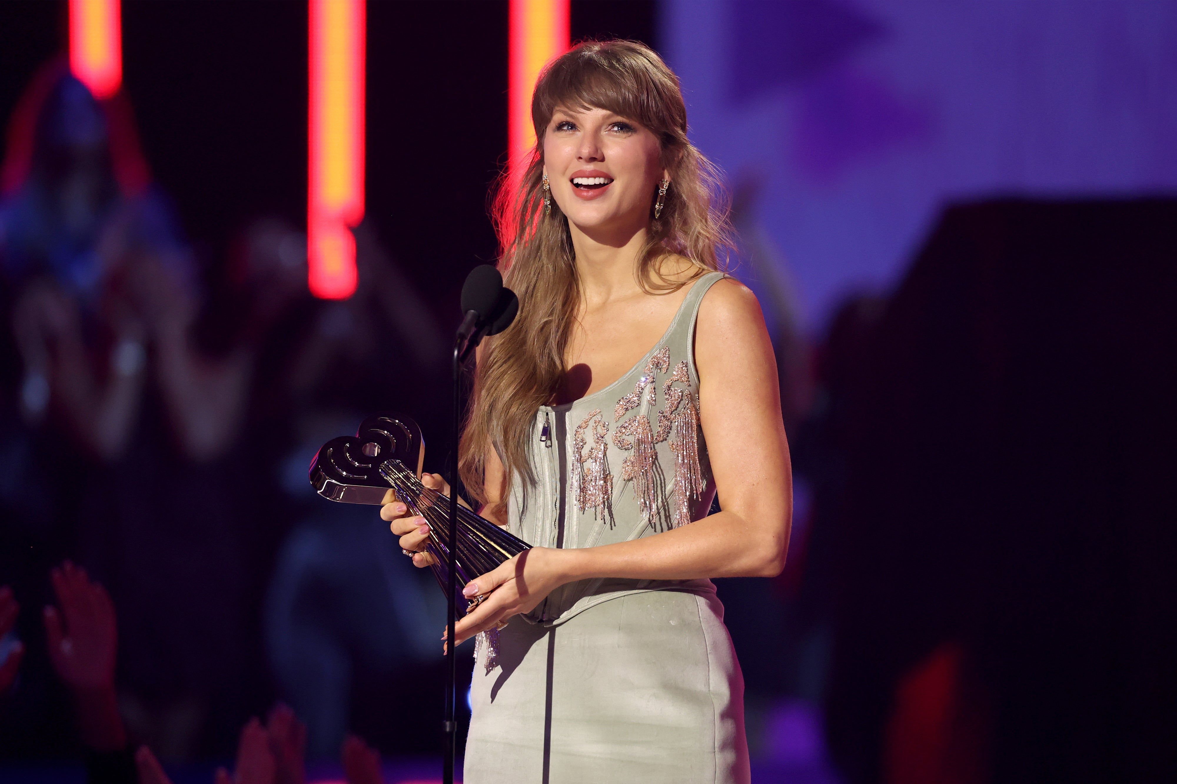 Taylor Swift accepts the Pop Album of the Year award onstage during the 2026 iHeartRadio Music Awards