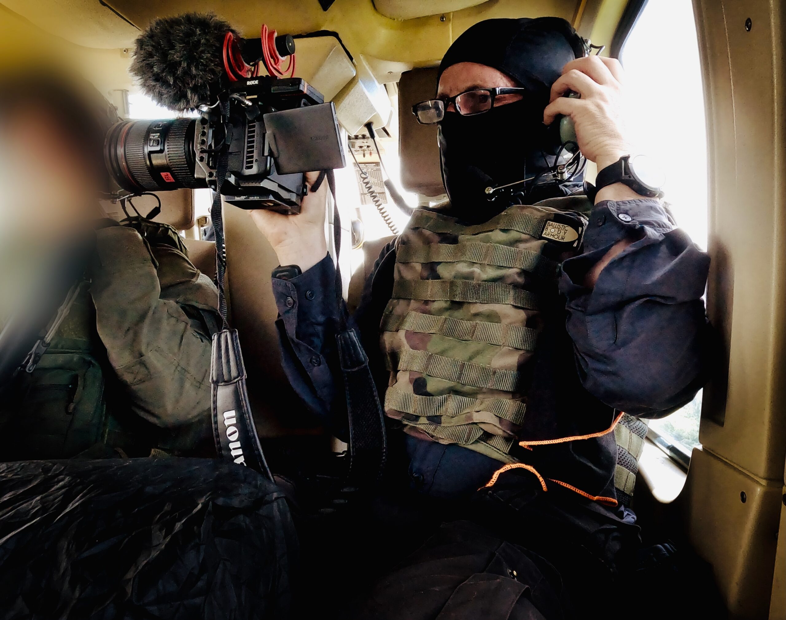Richard Ladkani undercover in a helicopter. Image © Malaika Pictures.