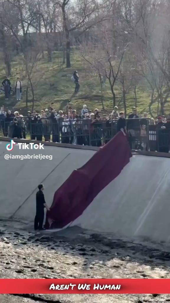 In 2016, in Almaty, a dog falls into the dam and is unable to get out due to slippery banks. People form a human chain to save the dog. After 10 years, this unforgettable moment is immortalized with a statue in March 2026