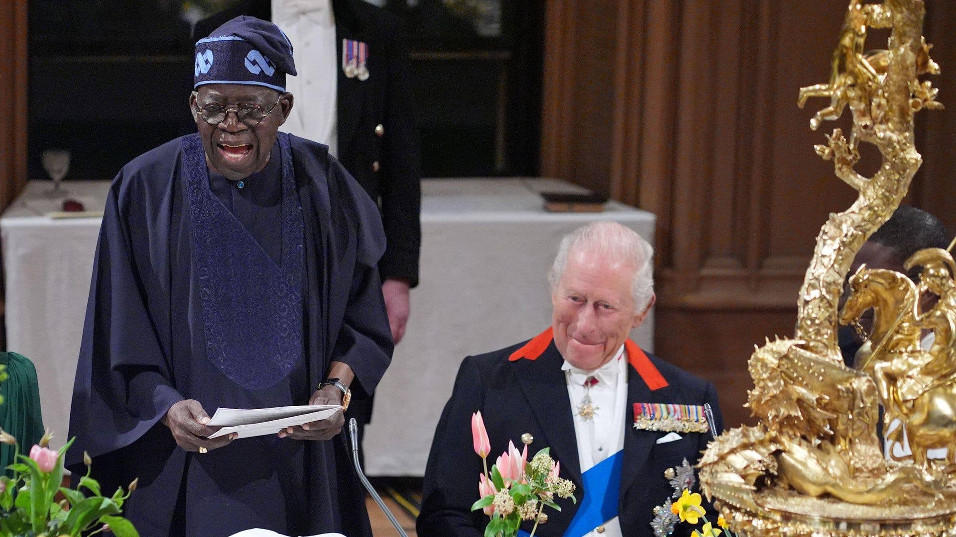 King Charles giggling during a speech delivered by Bola Ahmed Tinubu