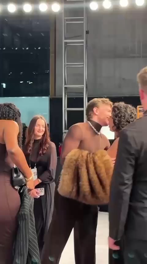 Hudson Williams telling Nia Costa that he is not going to watch 'The Bone temple' after she stepped on his train at the Vanity Fair after-party.