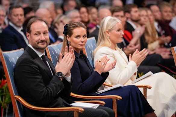 Norway’s Crown Prince Haakon, Princess Ingrid Alexandra and Crown Princess Mette-Marit applaud during the Nobel Peace Prize award ceremony, in Oslo last December.