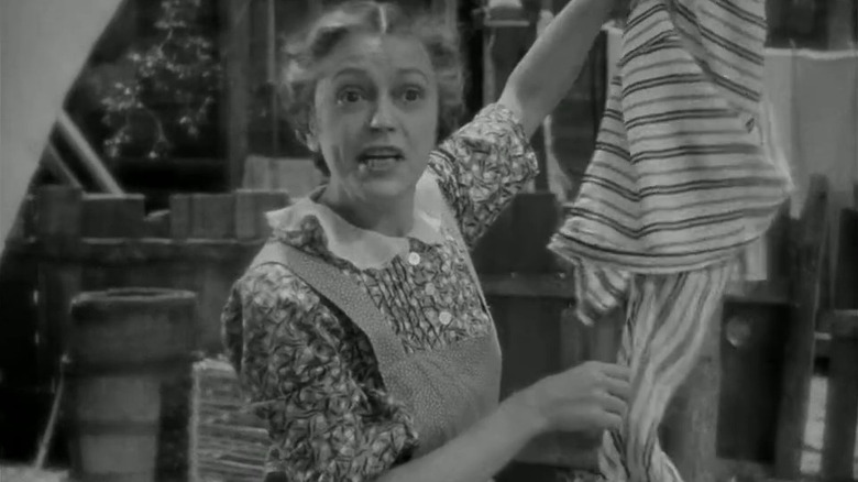 Mrs. Molly O'Leary (Alice Brady) doing laundry in In Old Chicago