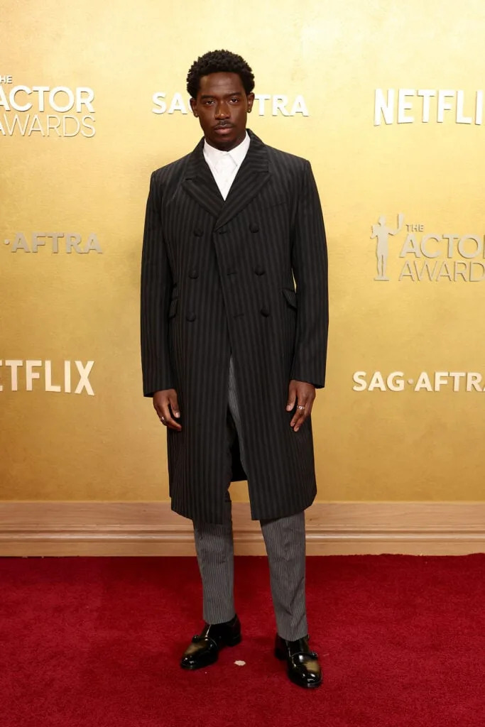 Damson Idris Prada Actor Awards 2026, Prada tailored suit, menswear red carpet 2026, Damson Idris style, black formalwear, sharp tailoring, modern menswear