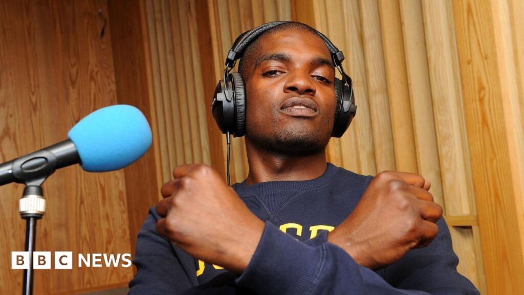 Tributes paid as grime star Dot Rotten dies aged 37 Dot Rotten crosses his arms across his chest while recording a session at the BBC's Maida Vale Studios in 2011
