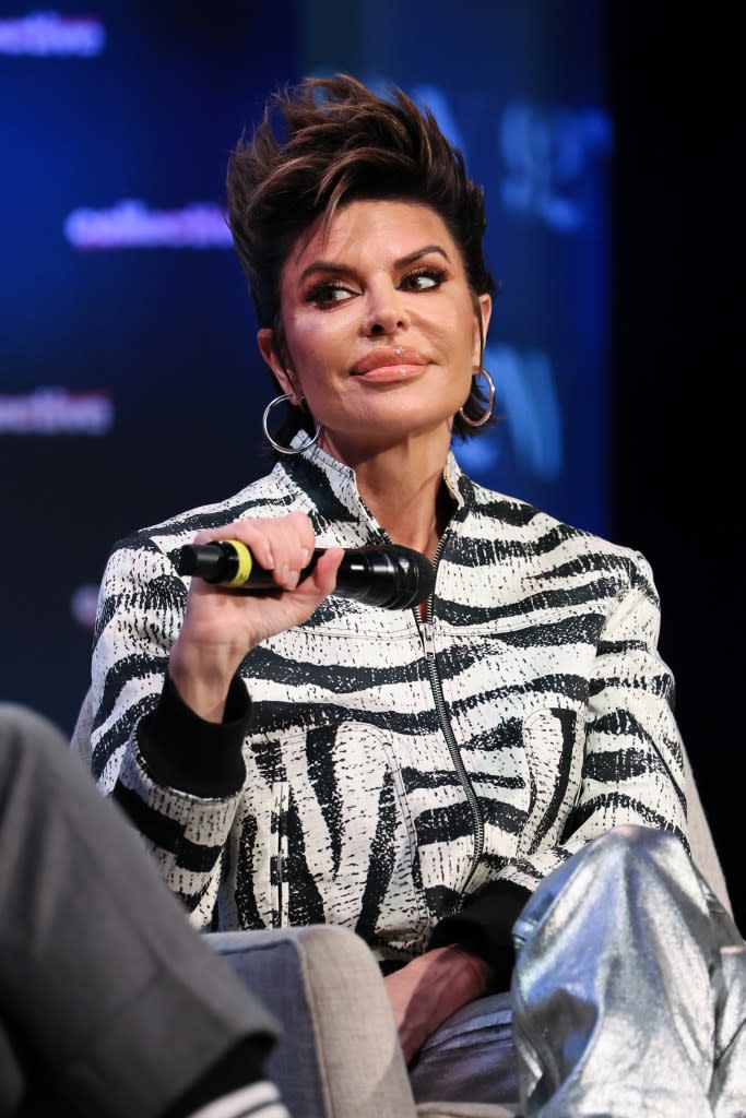 Lisa Rinna (pictured above speaking on stage at her “You Better Believe I’m Gonna Talk About It” event on Feb. 26) named Dionne Warwick as a “nasty piece of work” in her memoir, “You Better Believe I’m Gonna Talk About It.” Getty Images