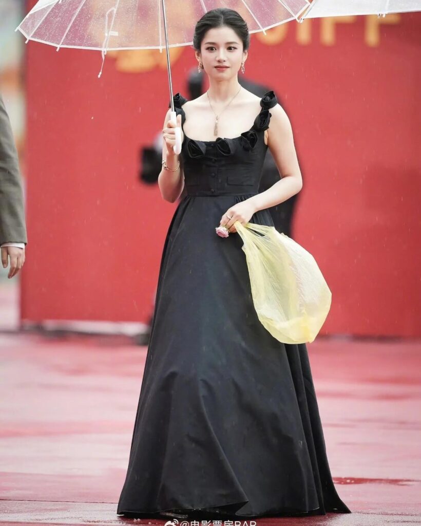 Internet fail: people thought Chinese actress Zhang Jingyi was carrying a Balenciaga trash bag at the Beijing Film Festival, turns out it was just a nod to her character who carries a yellow plastic bag.