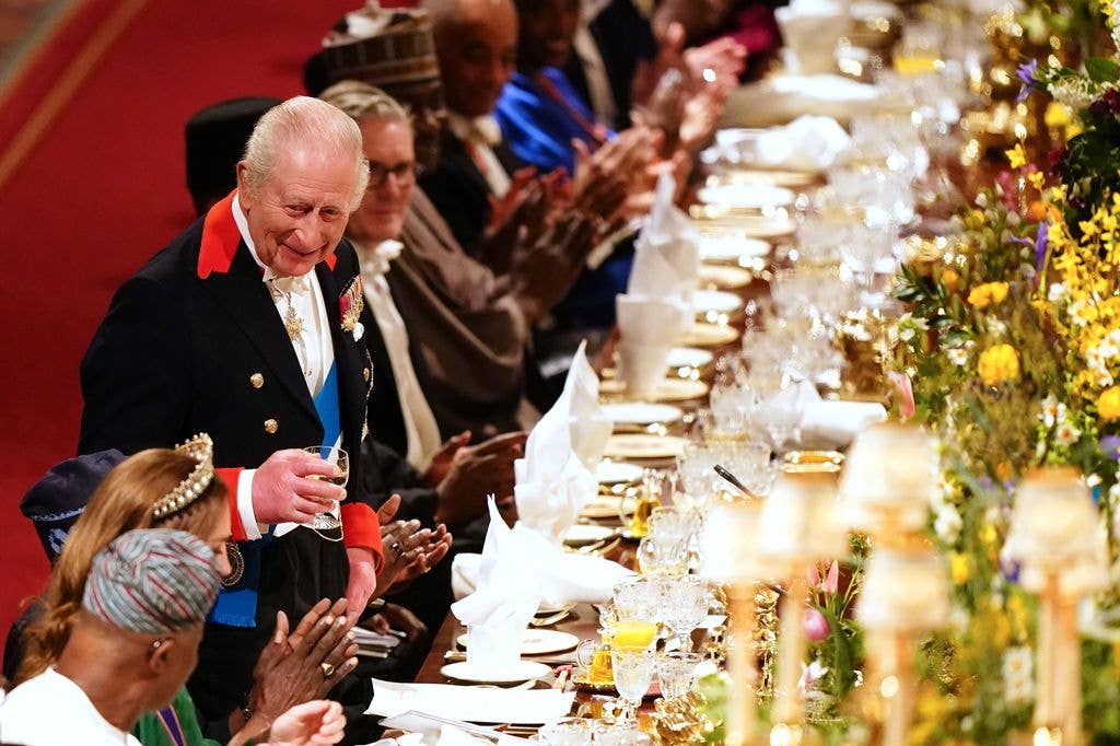 King Charles III delivers a speech during the state banquet