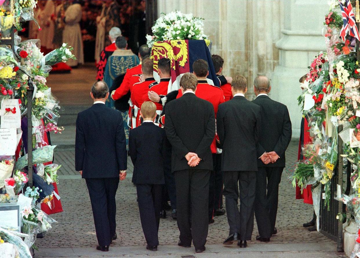 Prince Charles, Prince Harry, Earl Spencer, Prince William and the Duke of Edinburgh follow the coffin of Princess Diana as it is being carried into Westminster Abbey for a funeral service on Sept. 6, 1997.Credit: JEFF J MITCHELL/AFP