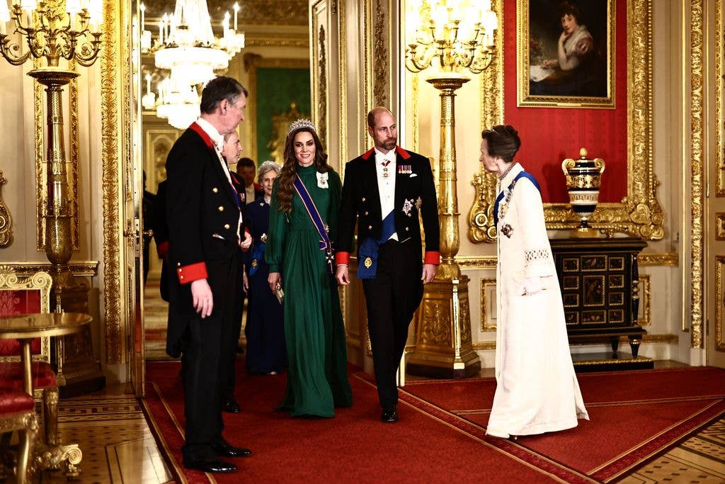 Kate Middleton and Prince William walking with Sir Timothy Laurence and Princess Anne on either side of them