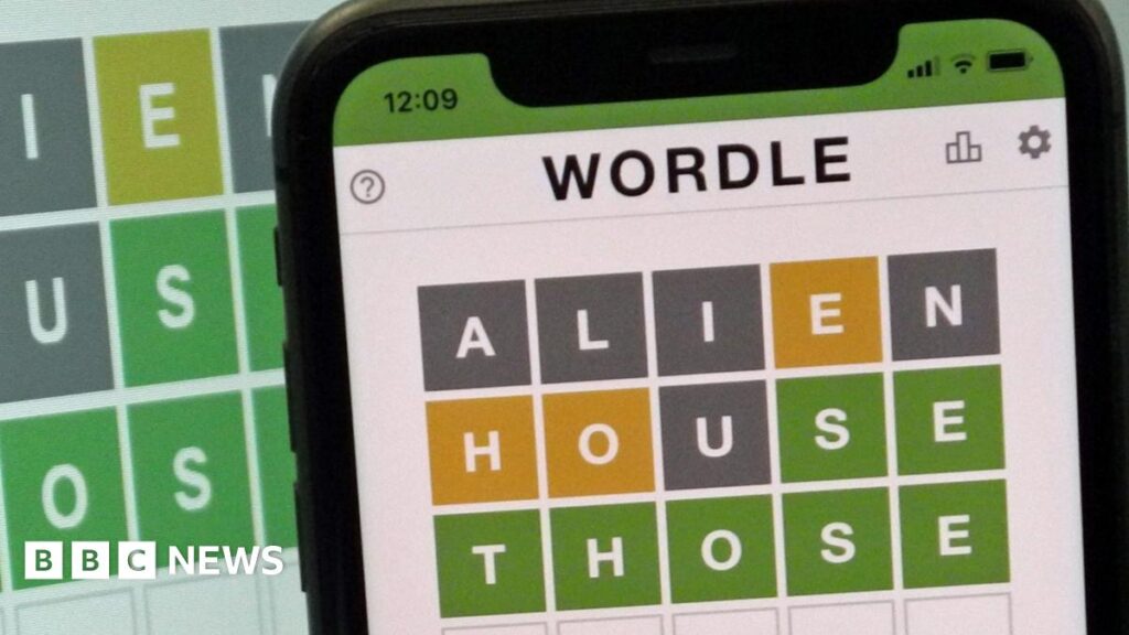 This images shows the screen of an IPhone, showing the screen of the online game, Wordle.