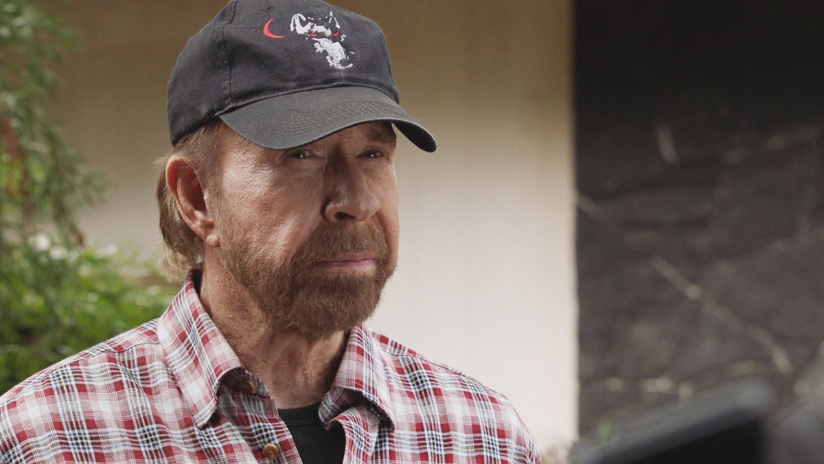 Chuck Norris acting out a scene in Hawaii.