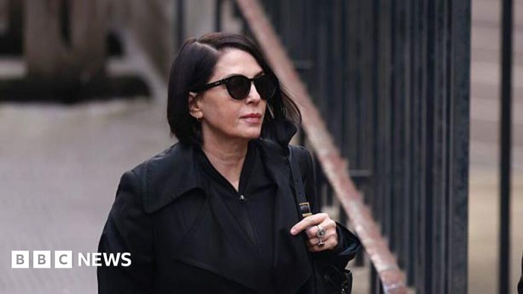 Former Daily Mail showbusiness editor denies hacking Sadie Frost’s voicemails Sadie Frost wearing sunglasses and a black jacket before entering court