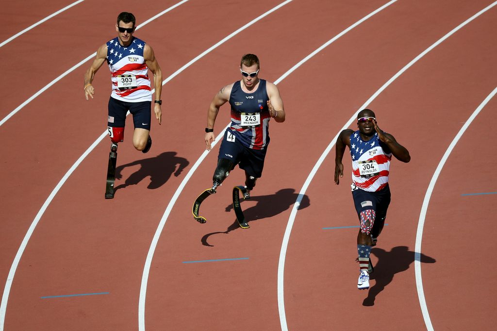 William Reynolds, Scott Meenagh and Adam Popp all running during the Invictus Games