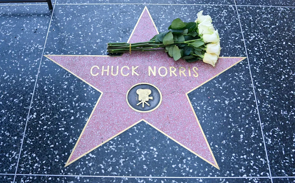 Flowers are left on the Hollywood Walk of Fame star of Chuck Norris following news of his death on March 20.