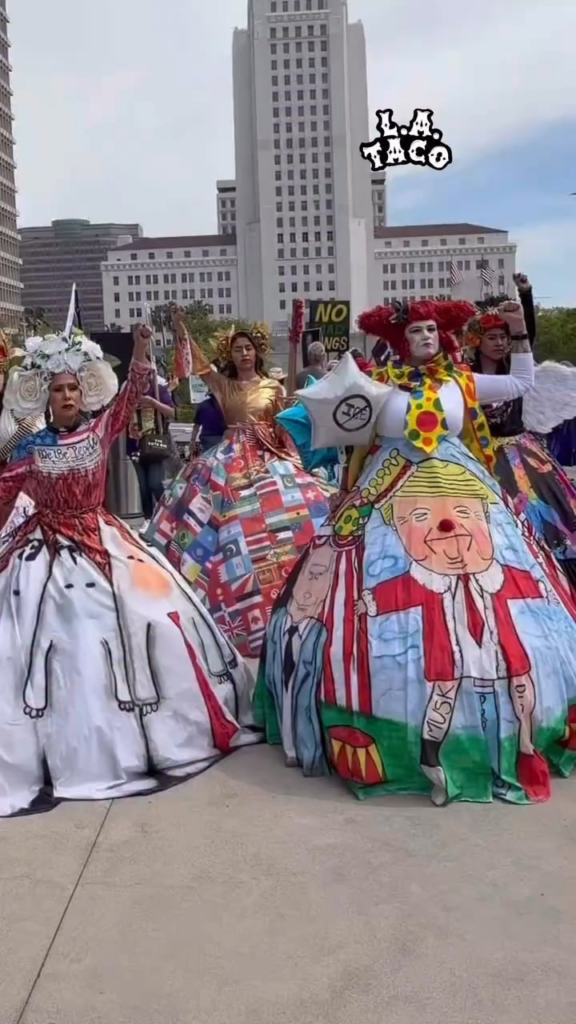 Los Angeles Chicana catrina artist Maria Flores displays protest pieces at ‘No Kings’ Protest at Gloria Molina Grand Park