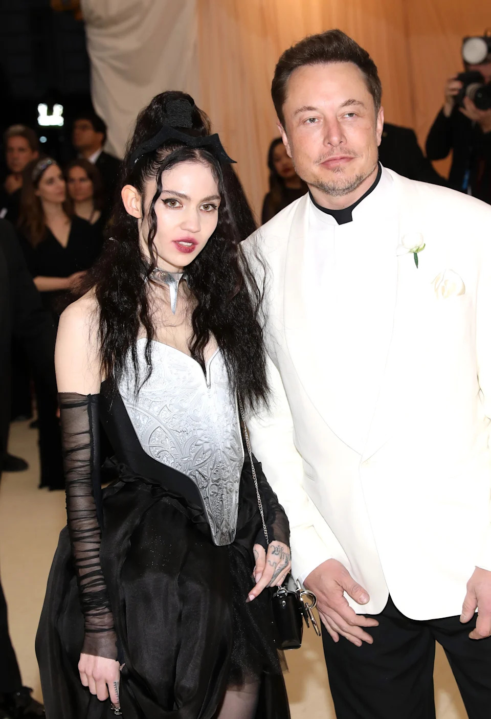 Grimes and Elon Musk at an event