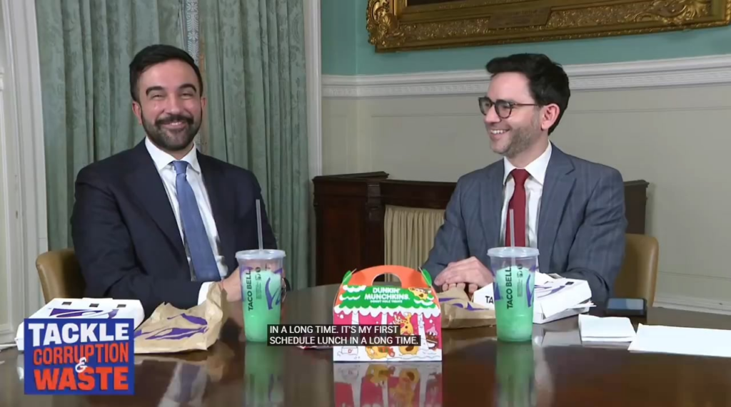 Zohran and Department of Consumer and Worker Protection commissioner Sam Levine announcing that nearly $2 million is being returned to over 800 workers at Taco Bell, Dunkin, and Theory. They made the announcement over Taco Bell and Dunkin