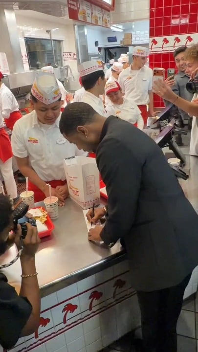 Michael B. Jordan spotted at In-N-Out Burger showing love to workers and fans while holding his Oscar after winning Best Actor in a Leading Role for Sinners at the 98th Academy Awards