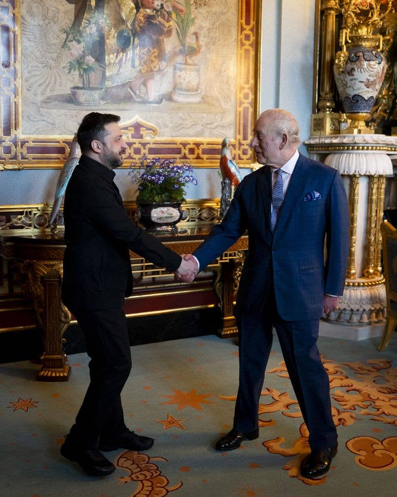 Zelensky and king charles shake hands