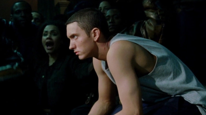 B-Rabbit (Eminem) sitting during a rap battle in 8 Mile