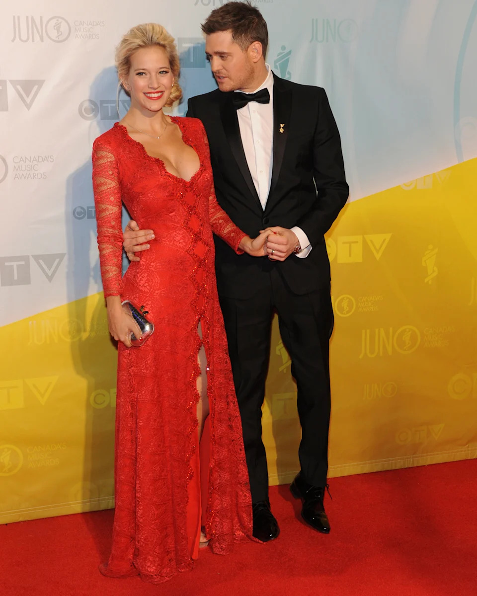REGINA, SK - APRIL 21: Singer and host of the 2013 Juno Awards Michael Buble and his wife Luisana Lopilato arrive on the red carpet at the Brandt Centre on April 21, 2013 in Regina, Canada. (Photo by Jag Gundu/Getty Images)