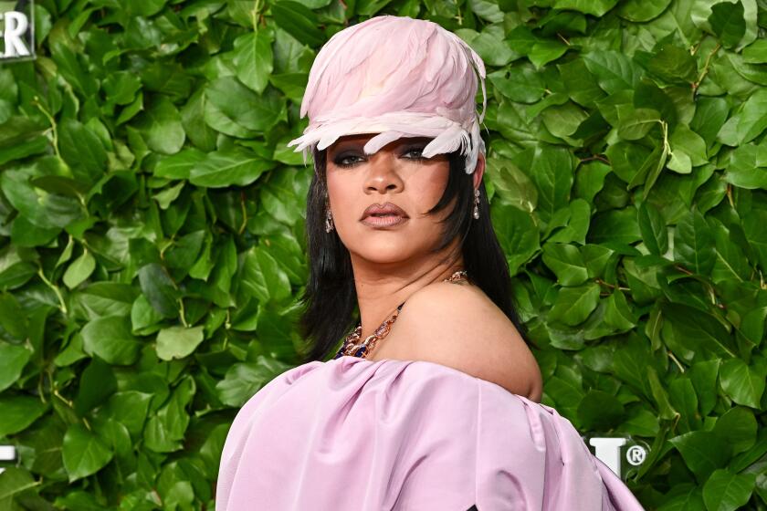 Rihanna at home as Beverly Hills mansion is hit by at least 10 rounds of gunfire, police say Yahoo entertainment home