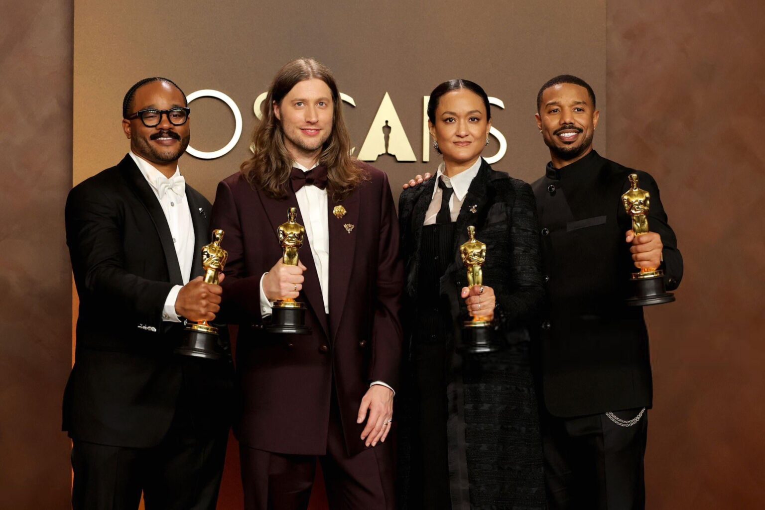 ‘Sinners’ winners Ryan Coogler, Ludwig Göransson, Autumn Durald Arkapaw and Michael B. Jordan with their Oscars