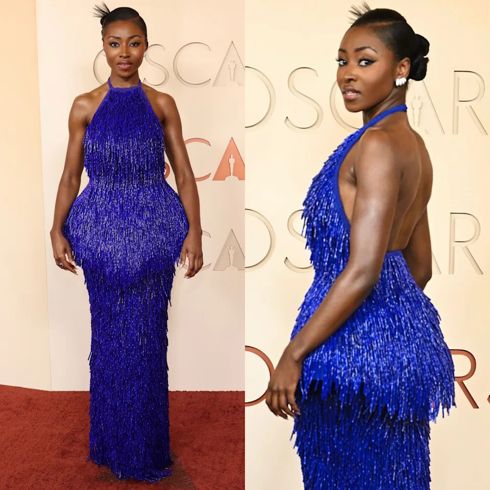 Jayme Lawson turned heads at the 2026 Oscars wearing a bold blue Loewe gown covered in shimmering fringe.