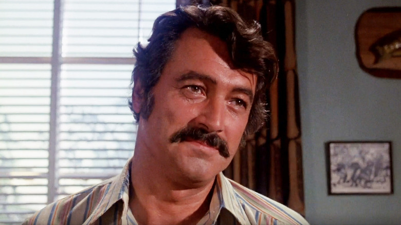 Rock Hudson's Michael "Tiger" McDrew is seen in closeup as he stands in a school office in Pretty Maids All in a Row