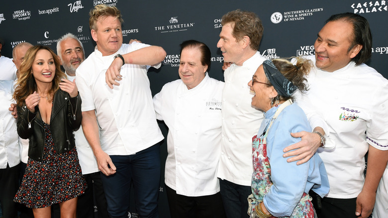 Celebrity chefs together on red carpet