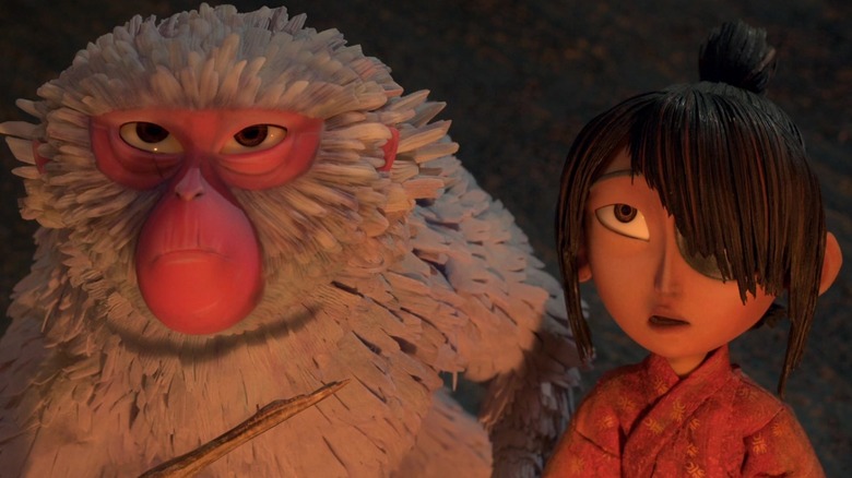 Sariatu and Kubo looking up at something in Kubo and the Two Strings