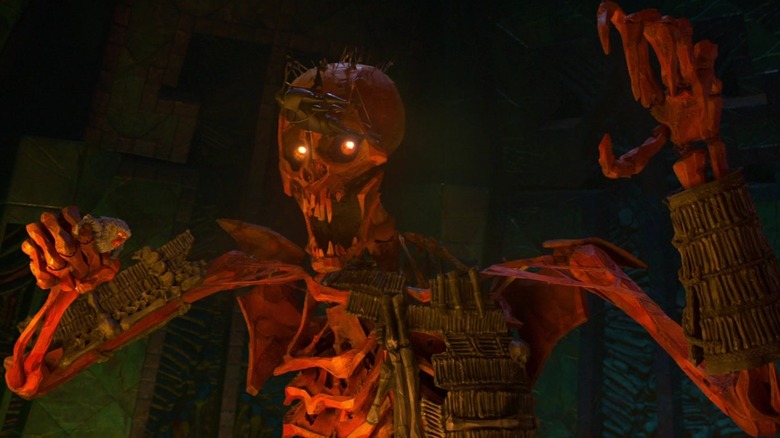 A giant skeleton with Monkey in its fist in Kubo and the Two Strings