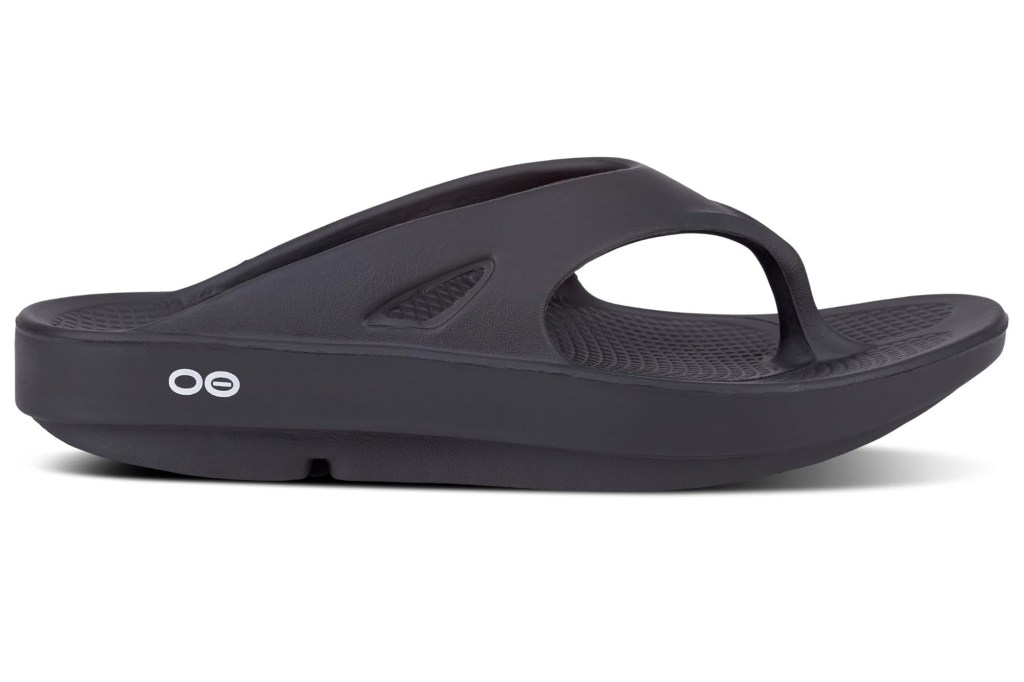A single black OOFOS OOriginal flip-flop.