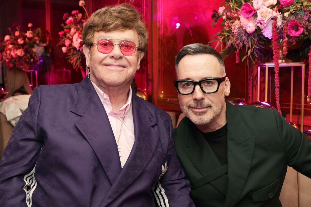 Elton John's husband David Furnish gives update on singer's health: 'He's battling on'