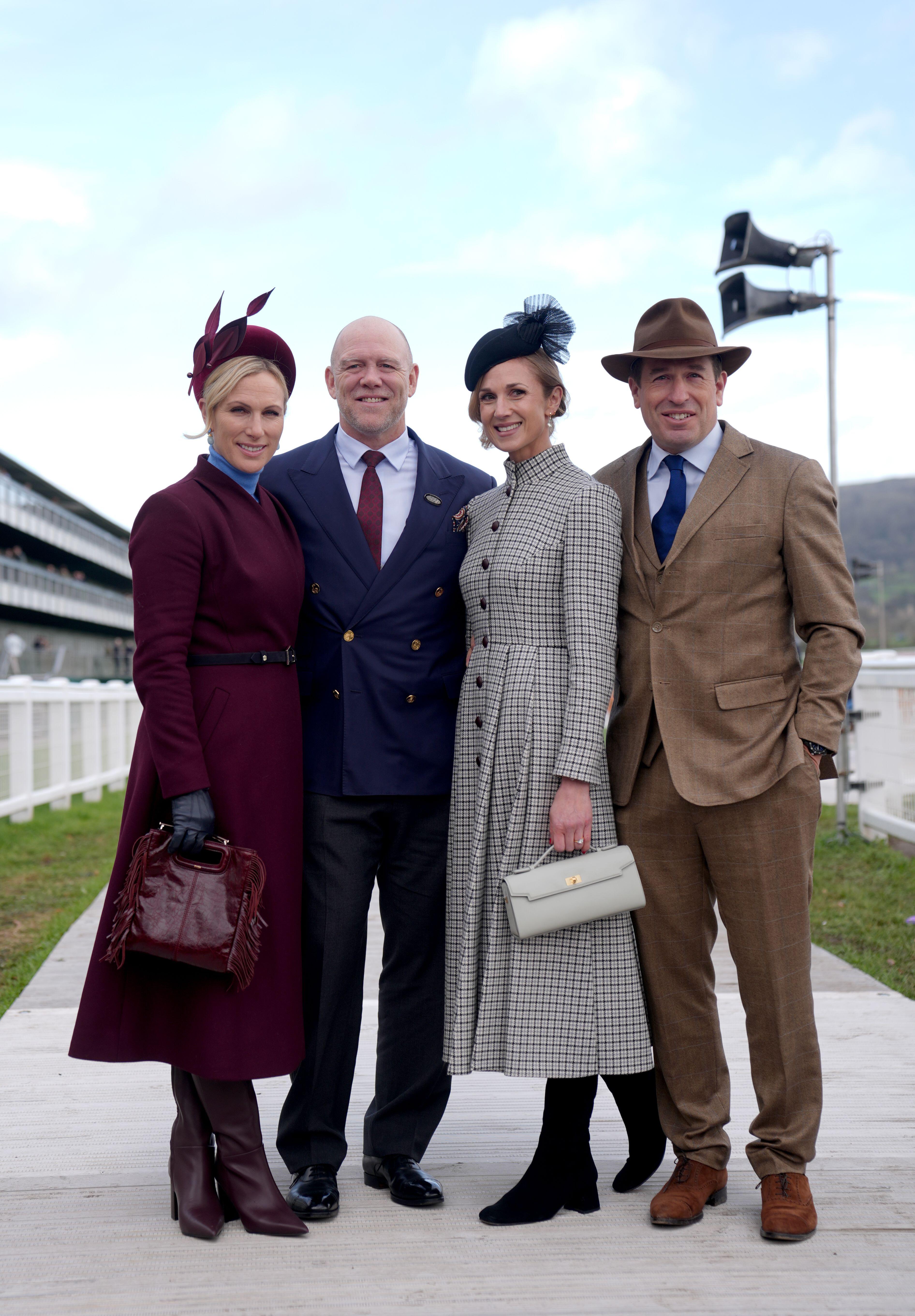Zara Tindall, Mike Tindall, Harriet Sperlilng, Peter Phillips standing in a row at Cheltenham races