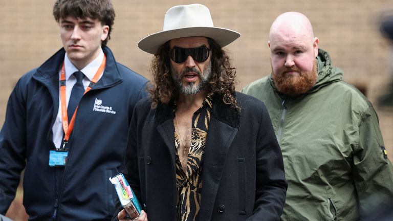 Brand brought a Bible to his last court appearance. Pic: Reuters