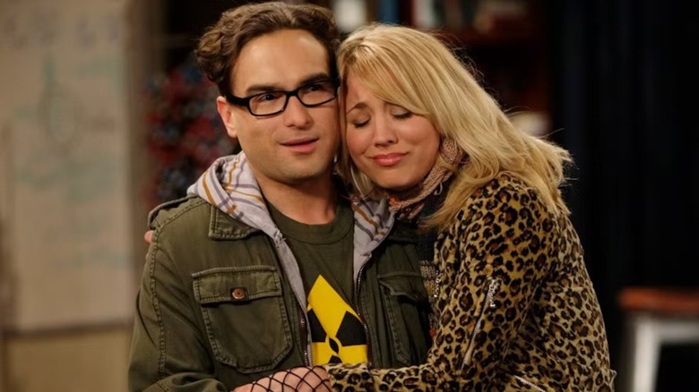 Kaley Cuoco's Penny cuddles up to Leonard Hofstadter on CBS' The Big Bang Theory.