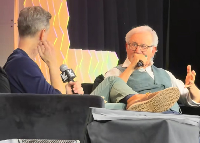Steven Spielberg speaking into microphone during interview, discussing Timothée Chalamet ahead of the Oscars event.