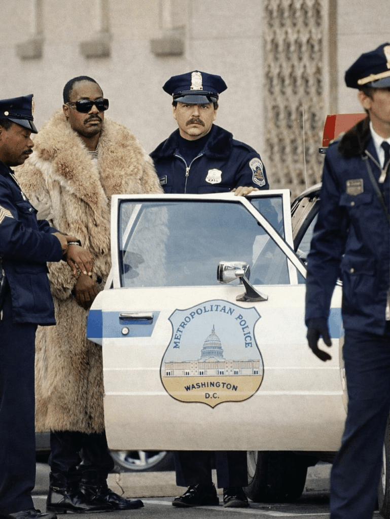 Stevie Wonder photographed after being arrested on February 14, 1985, during an anti-apartheid protest outside the South African Embassy in Washington, D.C. Detained alongside dozens, he later called himself a “conscientious criminal” in protest of injustice.