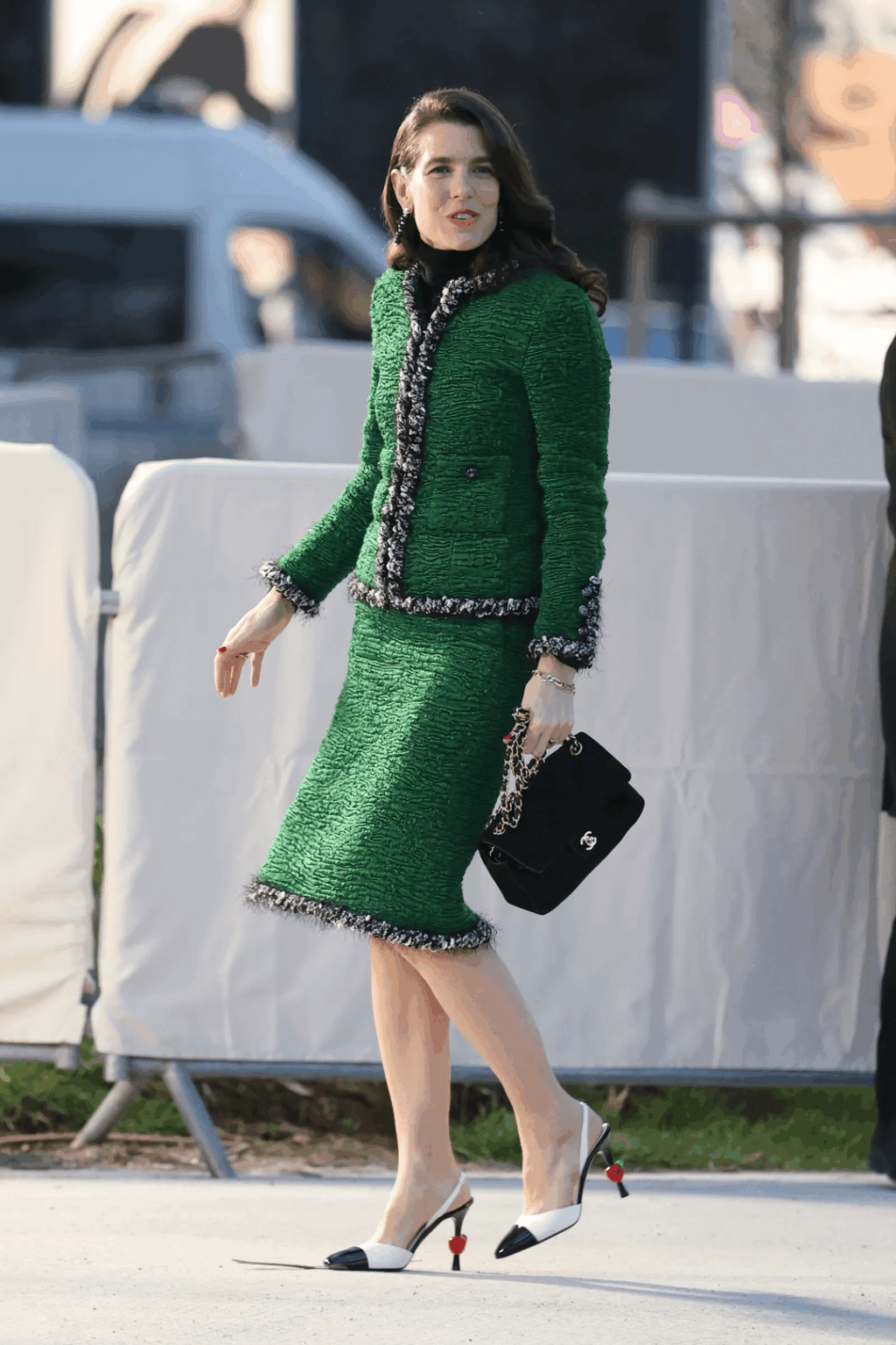 Charlotte Casiraghi at Chanel’s Fall/Winter 2026–2027 show in adorable apple-themed heels
