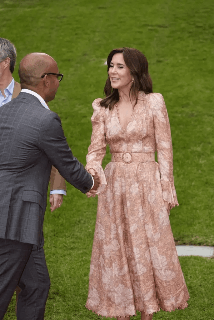 Queen Mary wearing Zimmermann, an Australian designer from Sydney, at a reception at the Royal Botanic Gardens in Melbourne