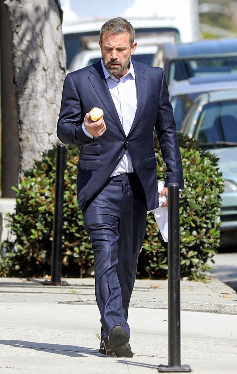 The 600 million man stepped out in a crisp blue suit and dark shades for his return to Santa Monica's Soulaire Anti-Aging clinic, picking up right where he left off after allowing himself a rare Easter weekend break from his now daily spa and apple. 